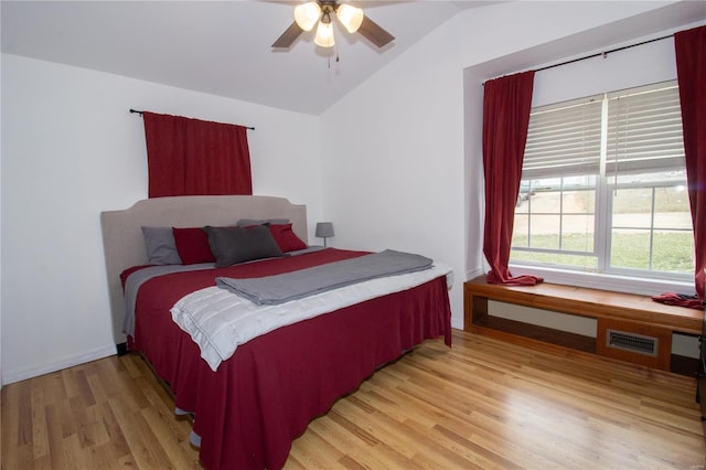 21680 N Horizonway N, Saint Robert, MO 65584 - bedroom featuring vaulted ceiling, light wood finished floors, and ceiling fan