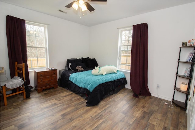 21680 N Horizonway N, Saint Robert, MO 65584 - bedroom with wood finished floors and a ceiling fan