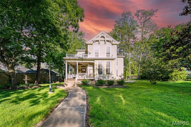 705 Jefferson St, Fulton, MO 65251 - victorian-style house featuring covered porch and a balcony