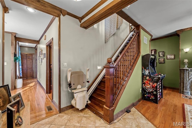 705 Jefferson St, Fulton, MO 65251 - staircase with crown molding, baseboards, wood finished floors, and recessed lighting