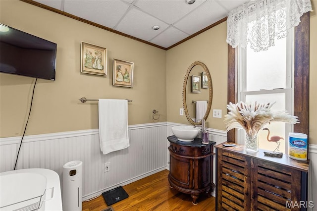 705 Jefferson St, Fulton, MO 65251 - bathroom featuring a wainscoted wall, ornamental molding, wood finished floors, and vanity