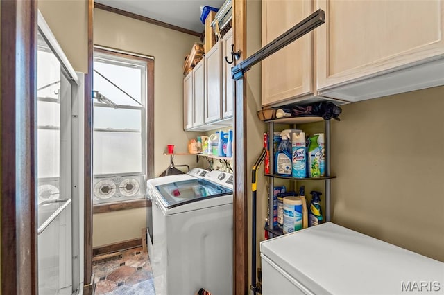 705 Jefferson St, Fulton, MO 65251 - laundry area featuring separate washer and dryer, cabinet space, and stone finish floors