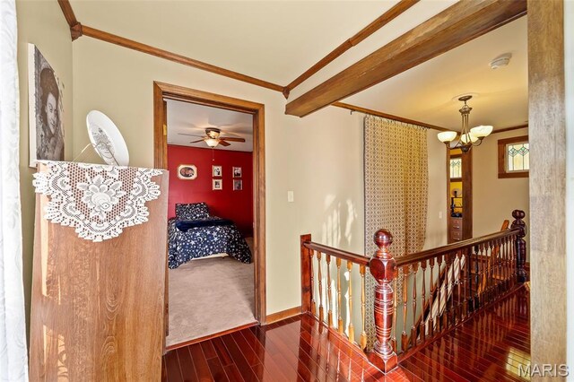 705 Jefferson St, Fulton, MO 65251 - corridor featuring an upstairs landing, wood-type flooring, a chandelier, crown molding, and baseboards