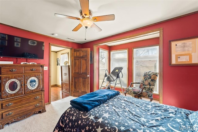 705 Jefferson St, Fulton, MO 65251 - bedroom with a ceiling fan and carpet flooring