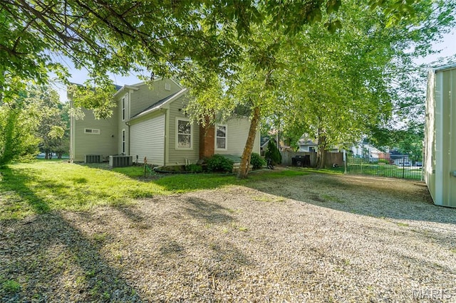 705 Jefferson St, Fulton, MO 65251 - view of home's exterior featuring central air condition unit