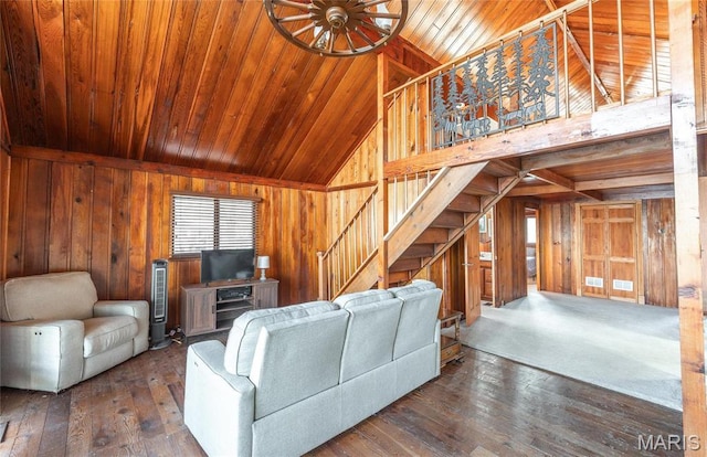 1382 Osage Rd, Cuba, MO 65453 - living area with wooden walls, vaulted ceiling, wooden ceiling, stairway, and hardwood / wood-style flooring