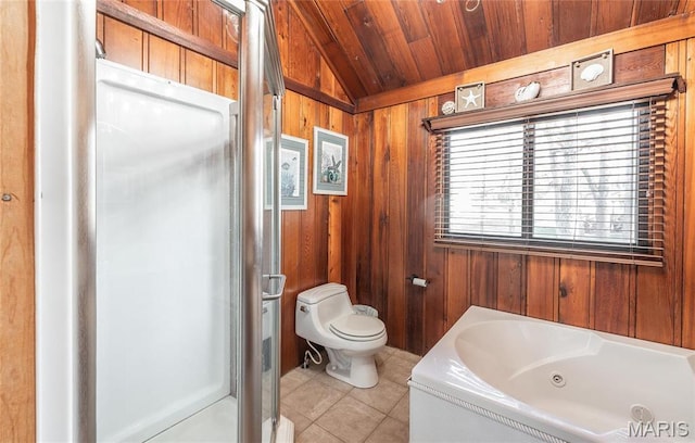 1382 Osage Rd, Cuba, MO 65453 - full bath with wood walls, tile patterned flooring, lofted ceiling, a tub with jets, and toilet