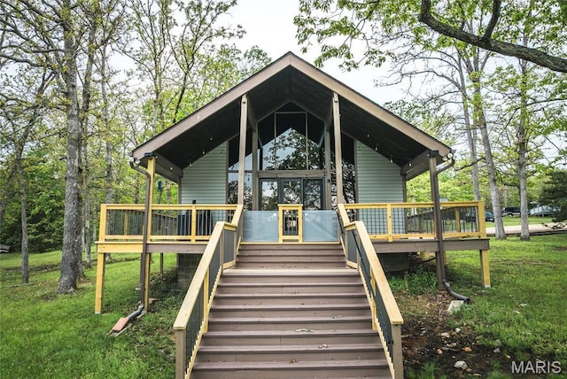 1382 Osage Rd, Cuba, MO 65453 - view of front of home featuring a front lawn, a wooden deck, and stairs