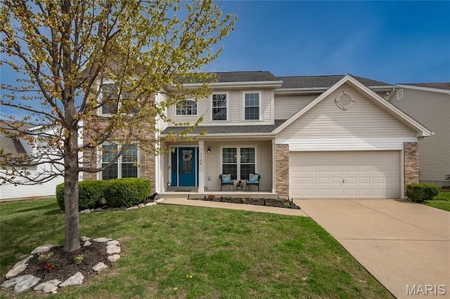 traditional-style home featuring driveway, a front lawn, a garage, and brick siding
