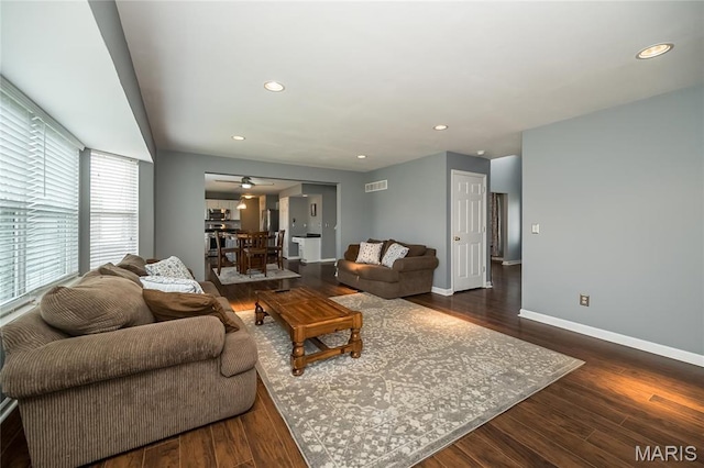 living room with baseboards, dark wood-style flooring, recessed lighting, and a ceiling fan