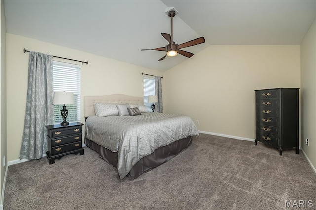 bedroom with vaulted ceiling, carpet floors, ceiling fan, and baseboards