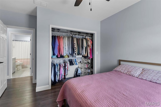 602 County Road 441, Jackson, MO 63755 - bedroom featuring a closet, wood finished floors, baseboards, and ceiling fan