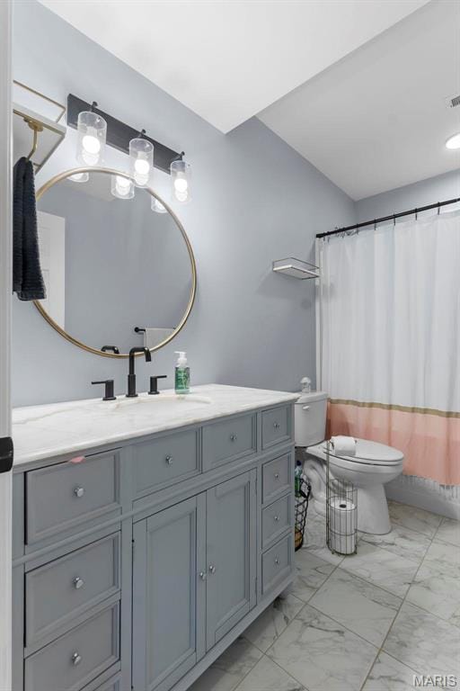 602 County Road 441, Jackson, MO 63755 - bathroom with marble finish floors, vanity, toilet, and curtained shower