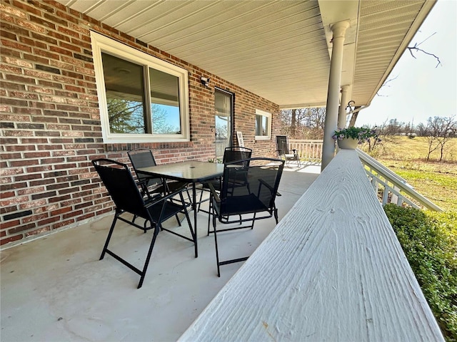 16892 Beaufort Rd, Crocker, MO 65452 - view of patio / terrace with outdoor dining area and covered porch