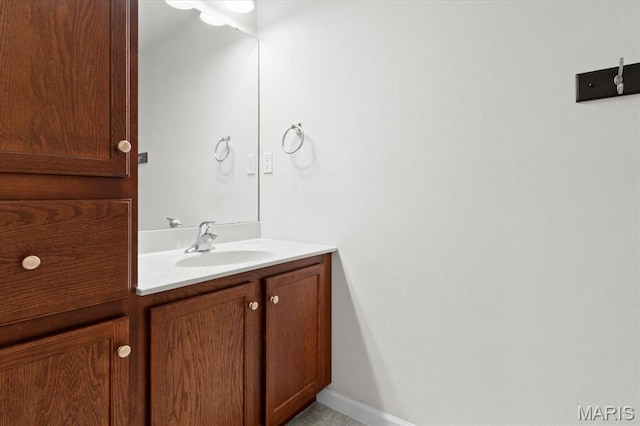 724 E Wesley Dr, Ofallon, IL 62269 - bathroom with vanity and baseboards
