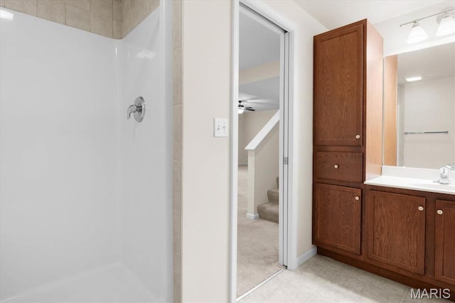724 E Wesley Dr, Ofallon, IL 62269 - full bathroom featuring vanity, a shower, and a ceiling fan