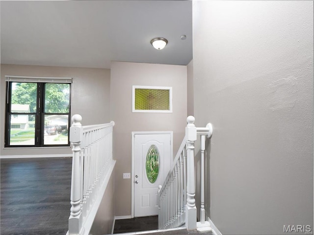 1464 Monopoly Dr, Florissant, MO 63031 - foyer entrance with baseboards and wood finished floors
