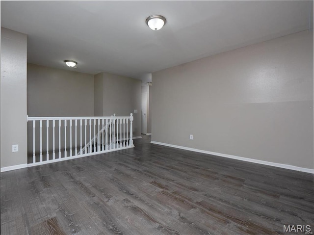 1464 Monopoly Dr, Florissant, MO 63031 - unfurnished room with wood finished floors and baseboards