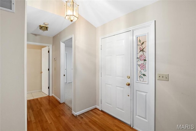 7310 Westover Colonial Ln, Saint Louis, MO 63119 - entryway featuring light wood-type flooring and baseboards