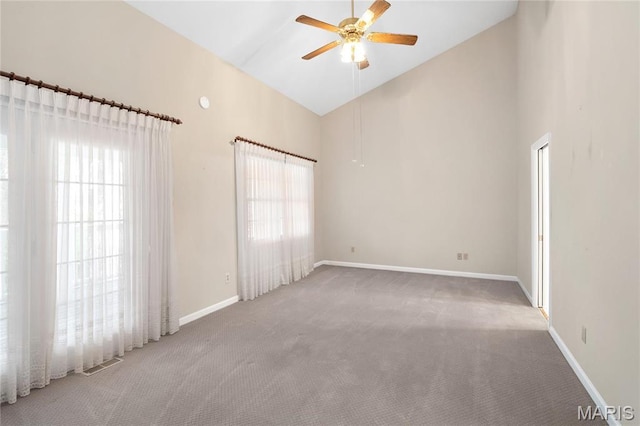 7310 Westover Colonial Ln, Saint Louis, MO 63119 - carpeted empty room featuring high vaulted ceiling, a ceiling fan, and baseboards