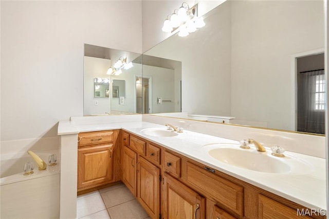 7310 Westover Colonial Ln, Saint Louis, MO 63119 - bathroom with tile patterned flooring, double vanity, a garden tub, and a chandelier