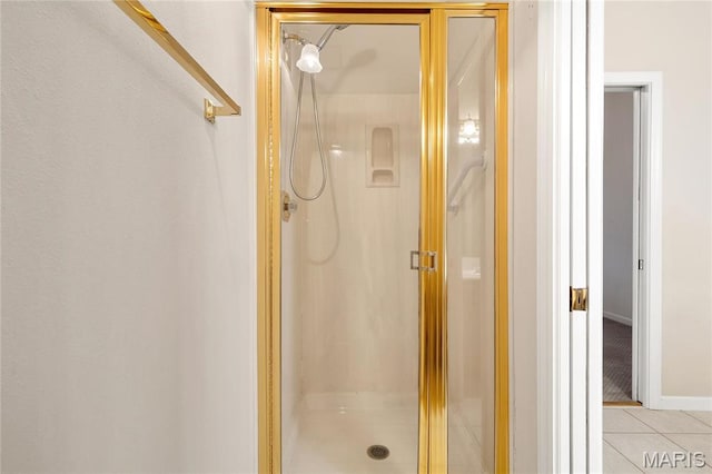 7310 Westover Colonial Ln, Saint Louis, MO 63119 - full bath with a shower stall, tile patterned floors, and baseboards