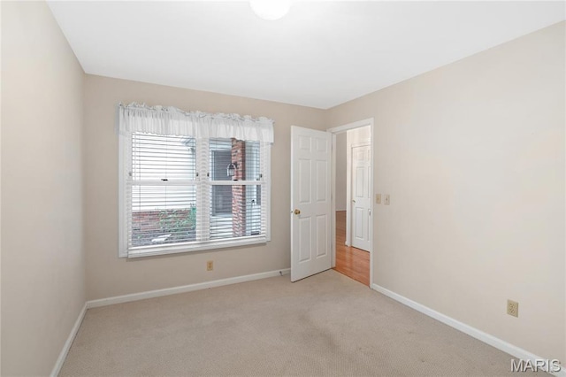 7310 Westover Colonial Ln, Saint Louis, MO 63119 - carpeted empty room featuring baseboards