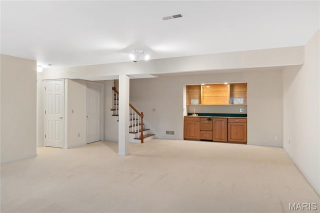 7310 Westover Colonial Ln, Saint Louis, MO 63119 - finished basement featuring stairway and light colored carpet