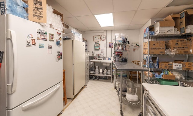 305 S Alvarado Ave, Belle, MO 65013 - kitchen featuring freestanding refrigerator and a drop ceiling