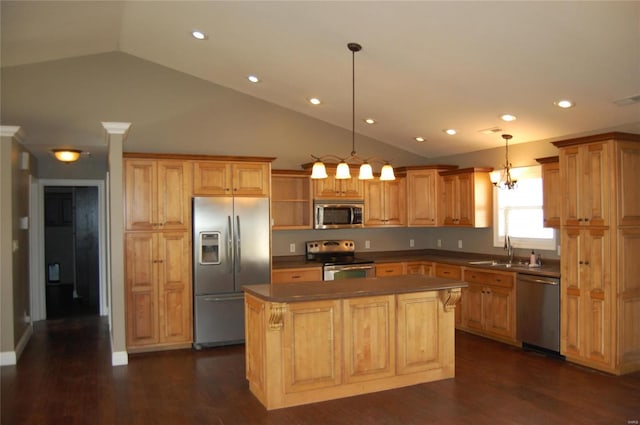 63 Bailey Rd, Poplar Bluff, MO 63901 - kitchen with appliances with stainless steel finishes, lofted ceiling, a sink, a kitchen island, and dark countertops