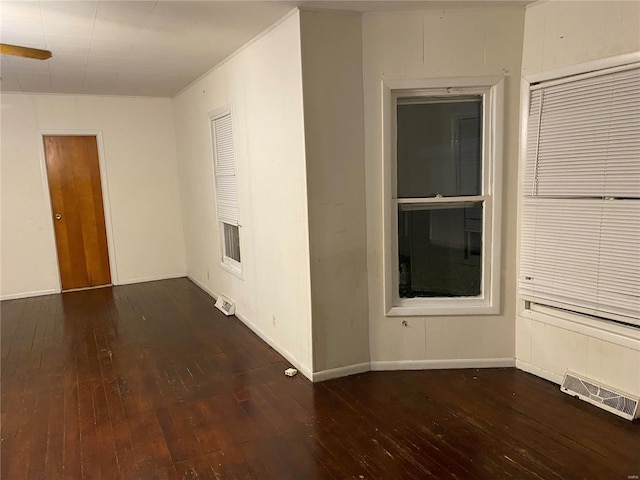 123 S Main St, Witt, IL 62094 - spare room with wood-type flooring and baseboards