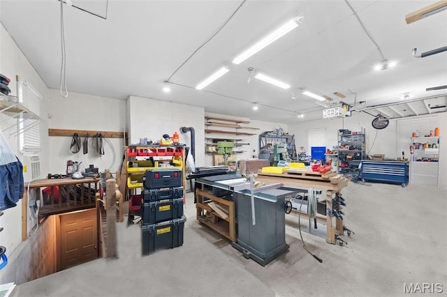 garage with a workshop area