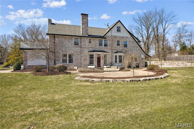 910 Kent Rd, Ladue, MO 63124 - back of property featuring a chimney and brick siding