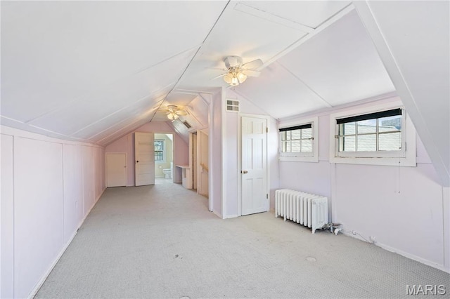 910 Kent Rd, Ladue, MO 63124 - additional living space featuring radiator, light carpet, lofted ceiling, and ceiling fan