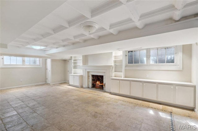 910 Kent Rd, Ladue, MO 63124 - unfurnished living room featuring coffered ceiling, beam ceiling, and a lit fireplace