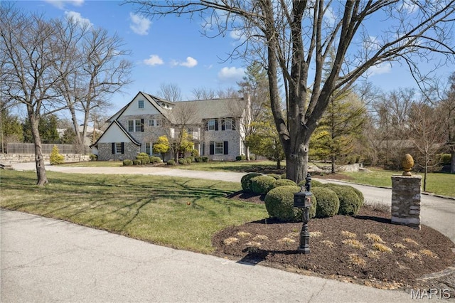 910 Kent Rd, Ladue, MO 63124 - view of front of house with stone siding