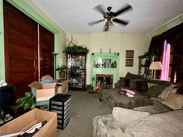 1426 N Newstead Ave, Saint Louis, MO 63113 - carpeted living area featuring a ceiling fan