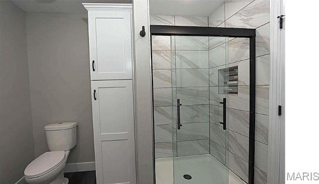 214 Gladiola St, Jackson, MO 63755 - bathroom featuring a shower stall and toilet
