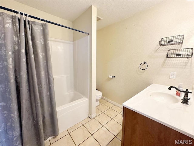 703 S Main St, Troy, IL 62294 - full bathroom with tile patterned flooring, vanity, toilet, shower / bath combo with shower curtain, and a textured ceiling