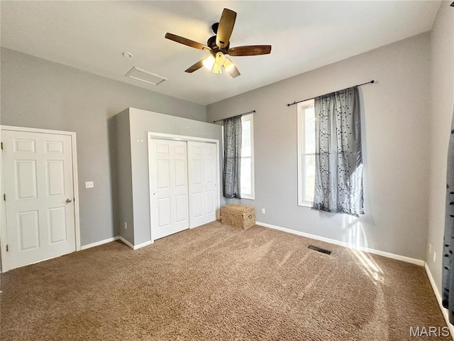703 S Main St, Troy, IL 62294 - unfurnished bedroom featuring carpet, a closet, and baseboards