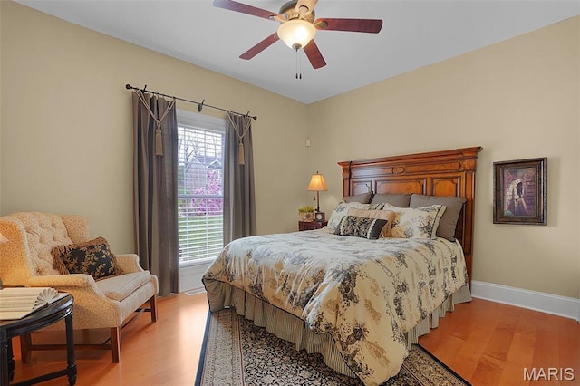 2009 Weber Heights Dr, Washington, MO 63090 - bedroom featuring light wood-type flooring, baseboards, and ceiling fan