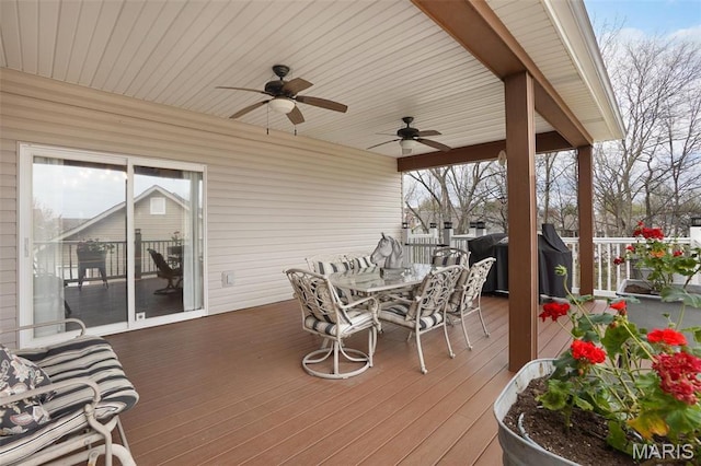 2009 Weber Heights Dr, Washington, MO 63090 - wooden terrace with outdoor dining area, a ceiling fan, and a grill