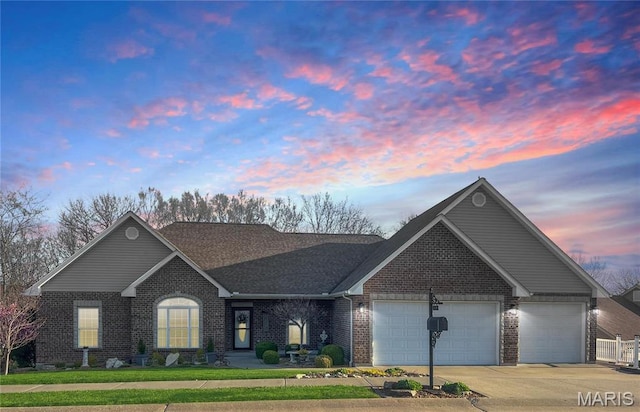 2009 Weber Heights Dr, Washington, MO 63090 - view of front facade featuring brick siding, an attached garage, concrete driveway, a yard, and a shingled roof