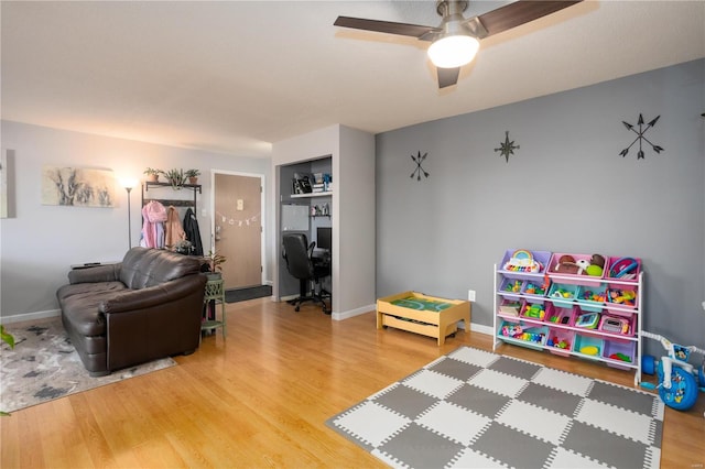 11921 Villa Dorado Dr Unit F, Saint Louis, MO 63146 - recreation room with wood finished floors, ceiling fan, and baseboards