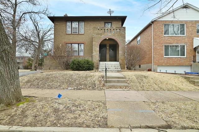 7227 Dartmouth Ave, Saint Louis, MO 63130 - view of front of property with brick siding and a chimney