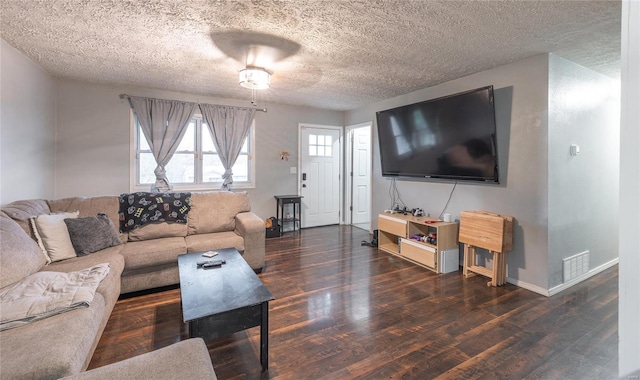 15105 Transit Rd, Saint Robert, MO 65584 - living room featuring a textured ceiling, wood finished floors, and baseboards