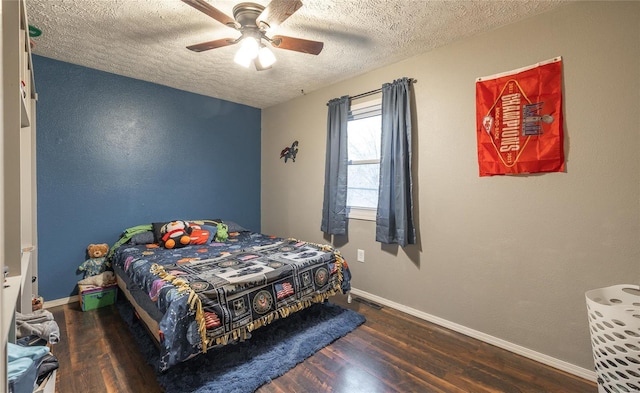 15105 Transit Rd, Saint Robert, MO 65584 - bedroom with a textured ceiling, wood finished floors, baseboards, and ceiling fan