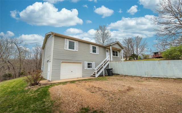 15105 Transit Rd, Saint Robert, MO 65584 - rear view of property with stairs and driveway