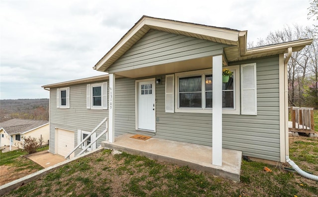 15105 Transit Rd, Saint Robert, MO 65584 - view of front of home featuring a garage