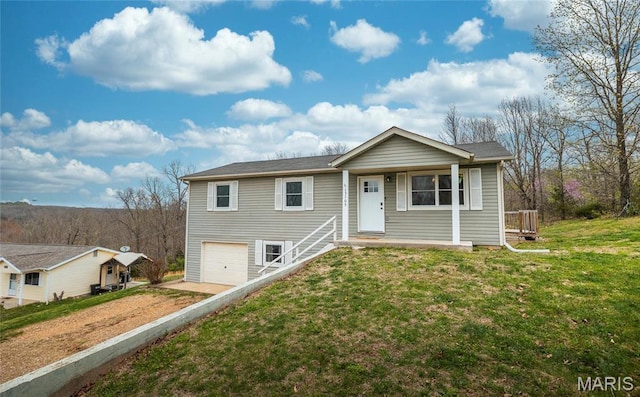 15105 Transit Rd, Saint Robert, MO 65584 - ranch-style house with a garage, a front lawn, and driveway